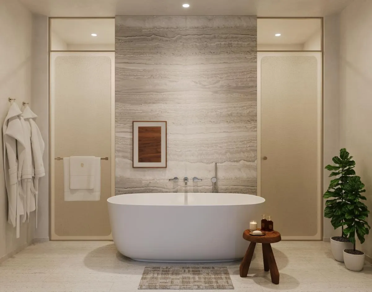 Bathroom rendering with a freestanding tub, a veined stone feature wall and a small framed brown artwork