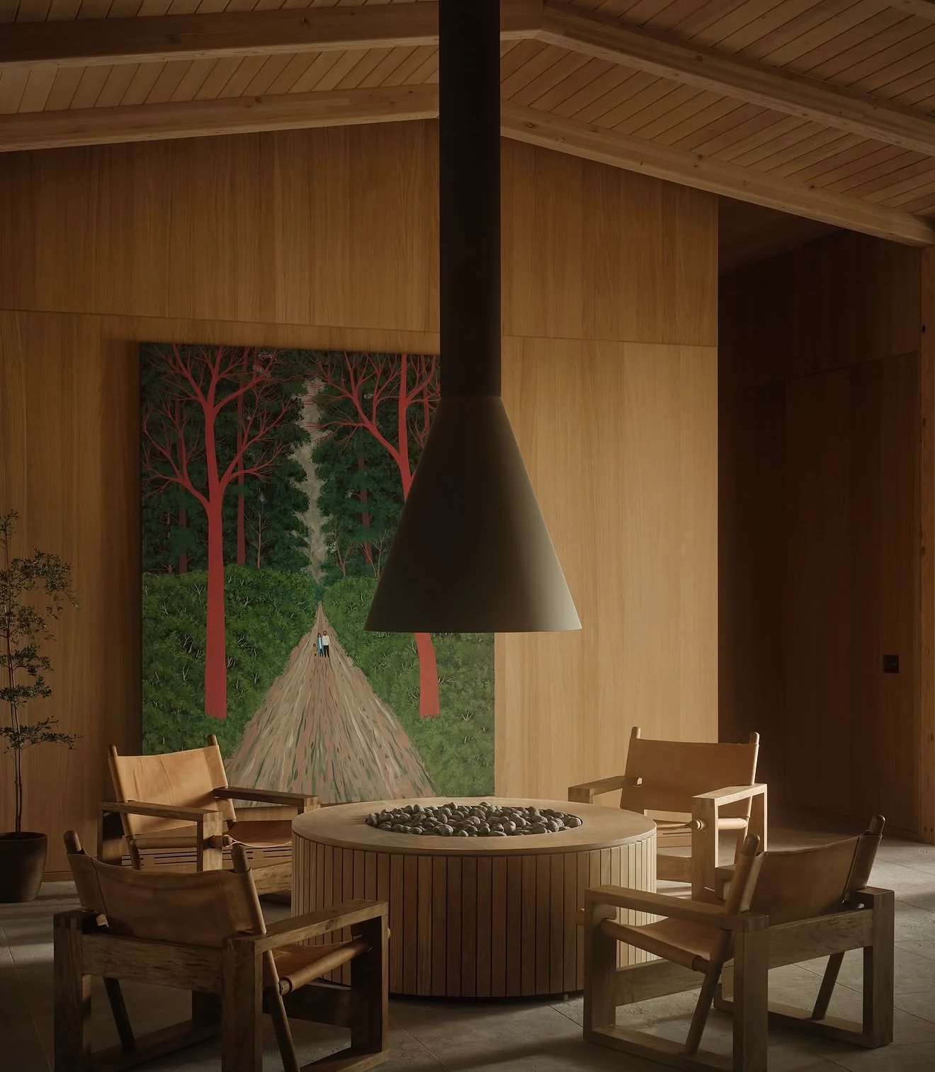 Wood-paneled living room with a large forest painting behind a round fire pit and leather chairs